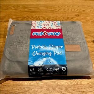 Brand New portable changing pad.